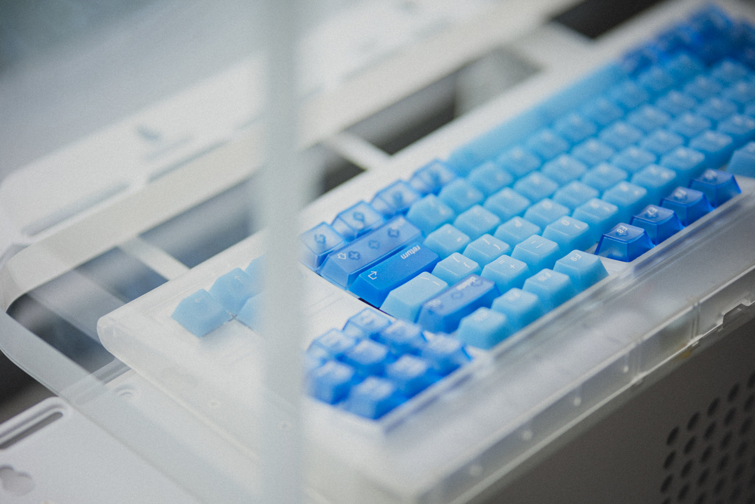 Angled close-up of Ocean Blue keycap tops on a keyboard