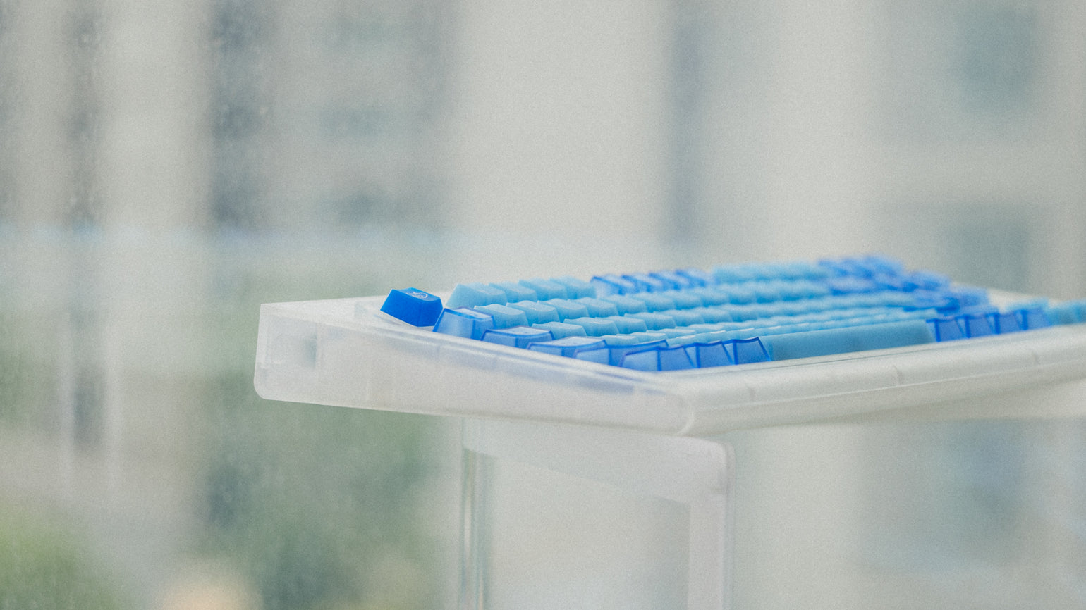 Side view showing the sculpted Cherry profile rows of Ocean Blue keycaps